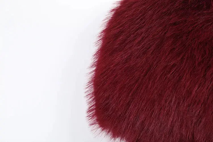 Sisterlinda furry jumpsuit fabric close-up in burgundy faux fur