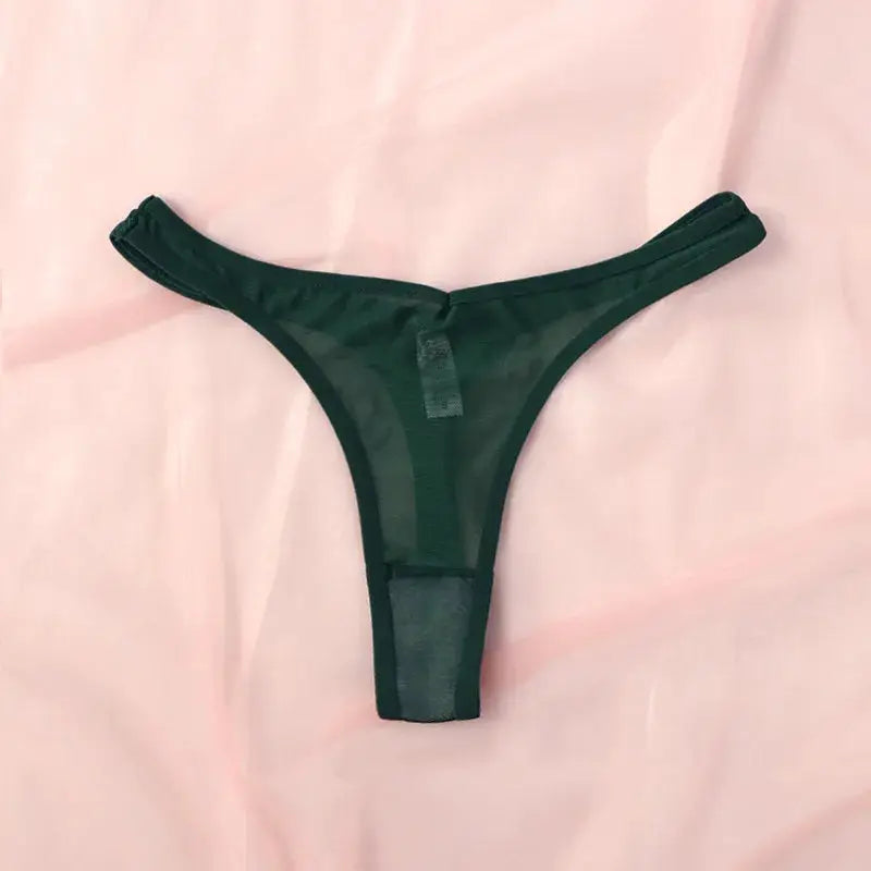 Green seamless thong for women with translucent mesh and T-back design