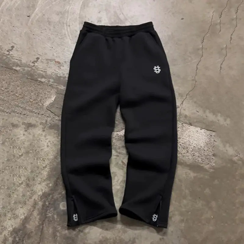 Drawstring black sweatpants by Simples Market with zipper hems, high-waist streetwear
