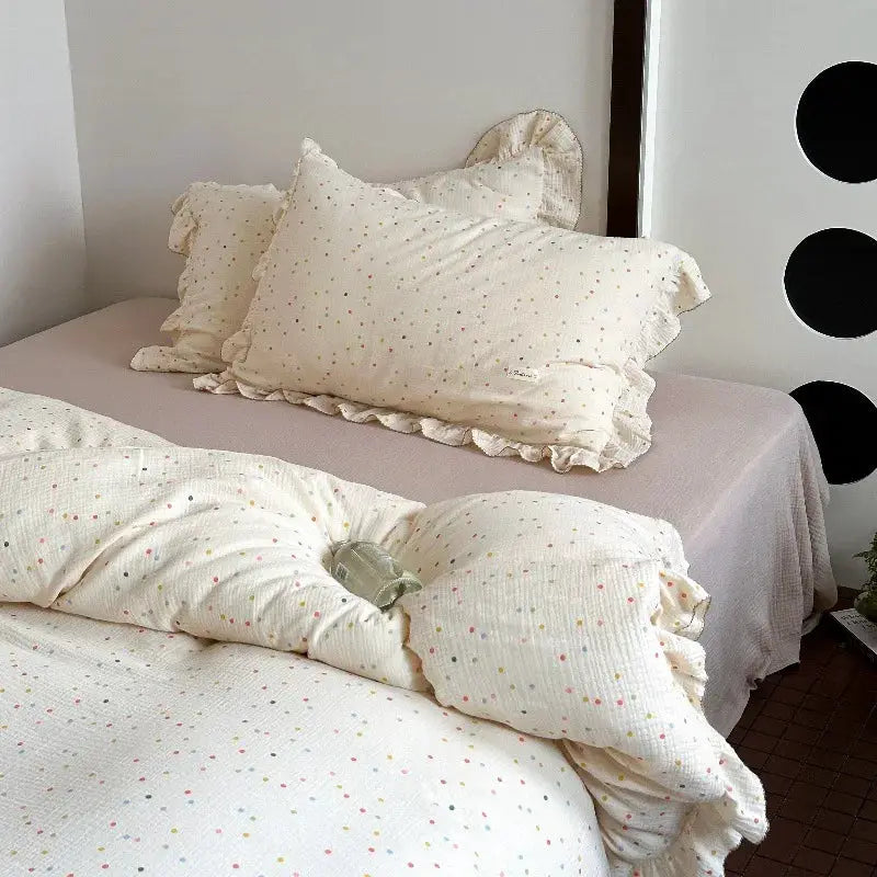 INS Princess 3-piece bedding set by Simples Market, cotton gauze with ruffle-edged pillowcases, cream with pastel dots.