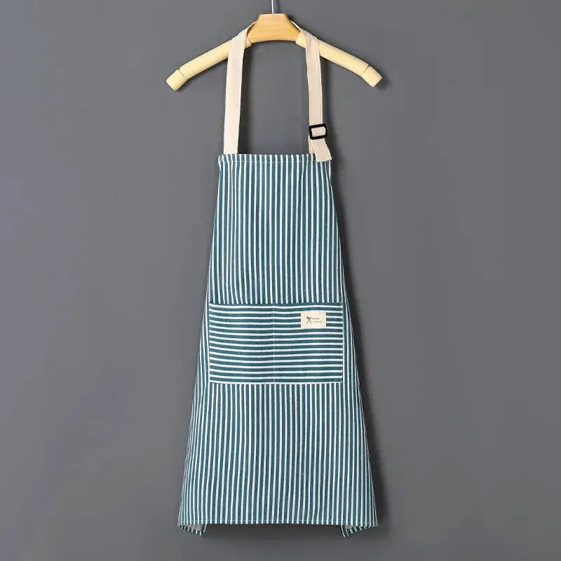 Simples Market cotto linen striped apron with thin cotton waistband, teal/white vertical stripes, front pocket
