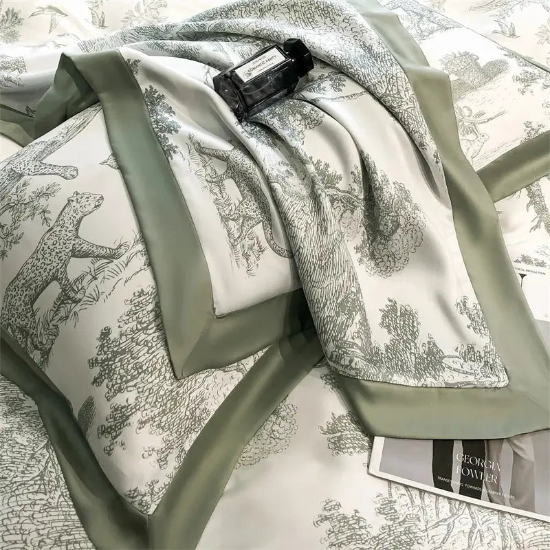 Duvet cover set in Lyocell with forest plant leopard print and sage-green borders by Simples Market