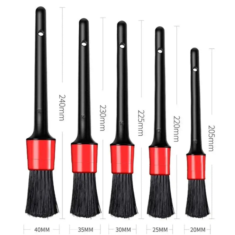 Five-piece car detailing brush set with black handles and red ferrules for interior cleaning; varying sizes.