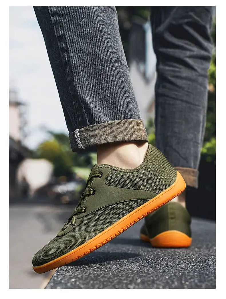 Men trail running shoes in olive green with orange outsole, lace-up minimalist barefoot-style sneakers