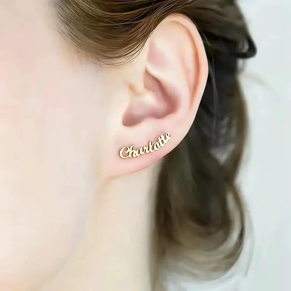 Gold-tone stainless steel name stud earring with Charlotte script, personalized women's jewelry