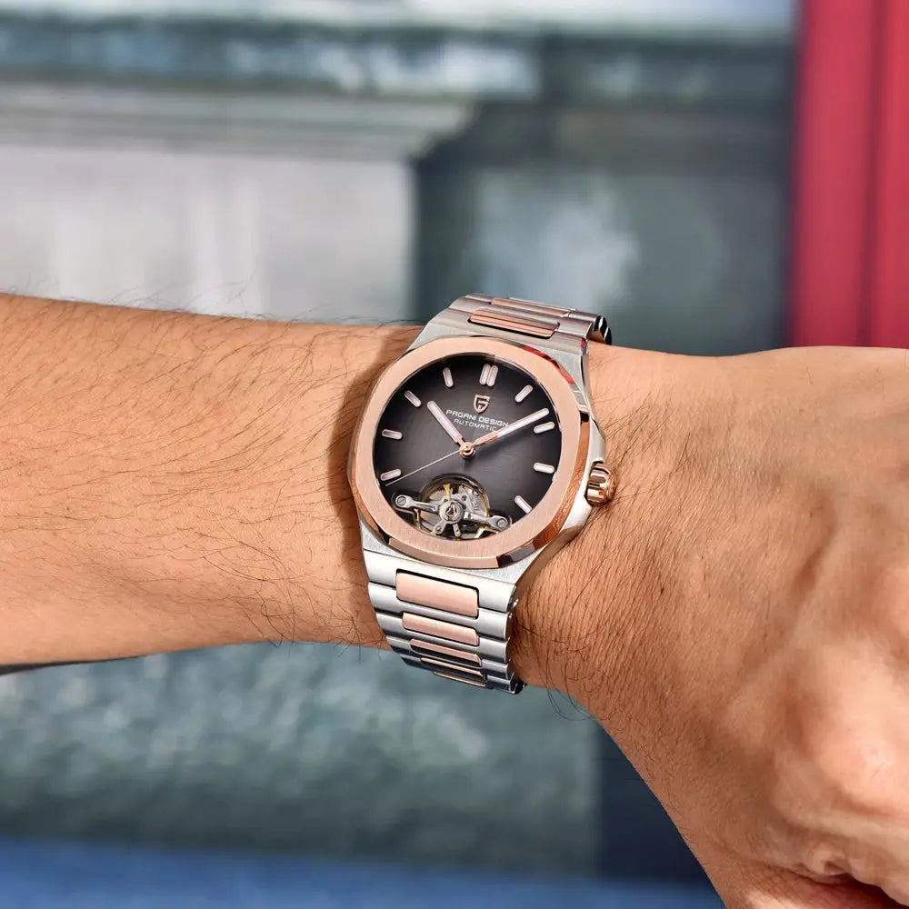Pagani Design 2026 men's skeleton automatic watch, two-tone stainless steel with rose-gold bezel on wrist