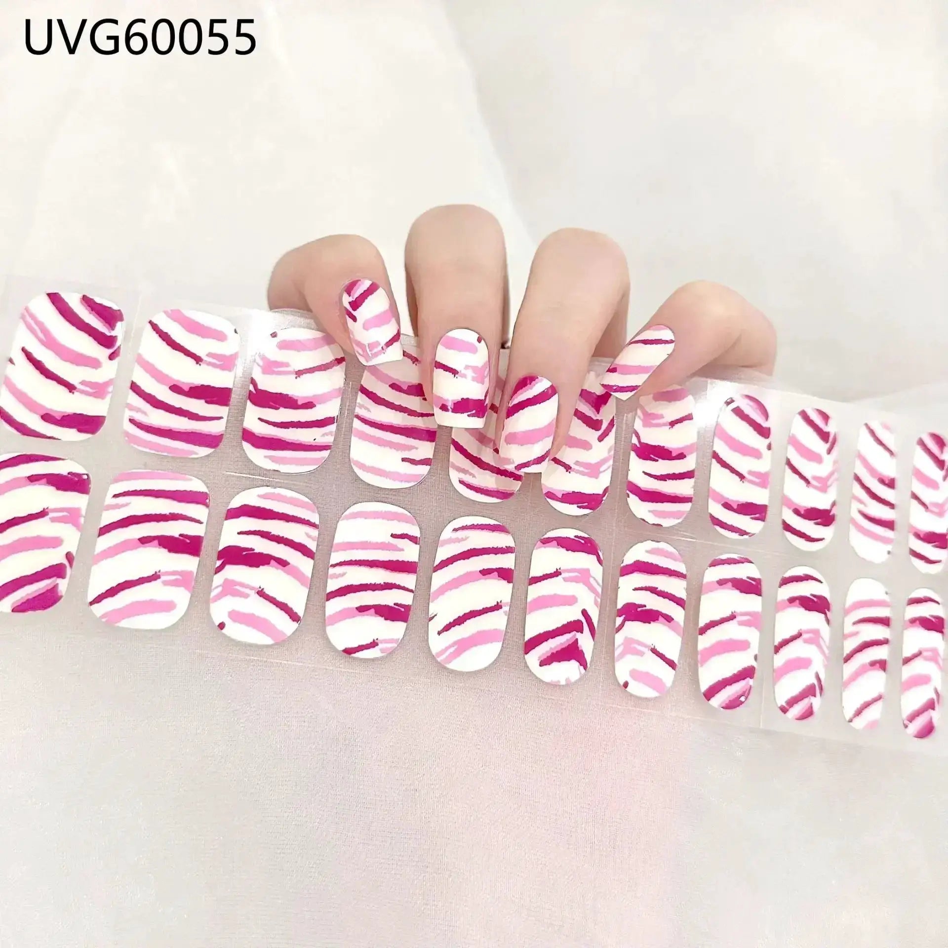 Gel nail wrap set with pink zebra stripes on white background; full-cover DIY manicure stickers