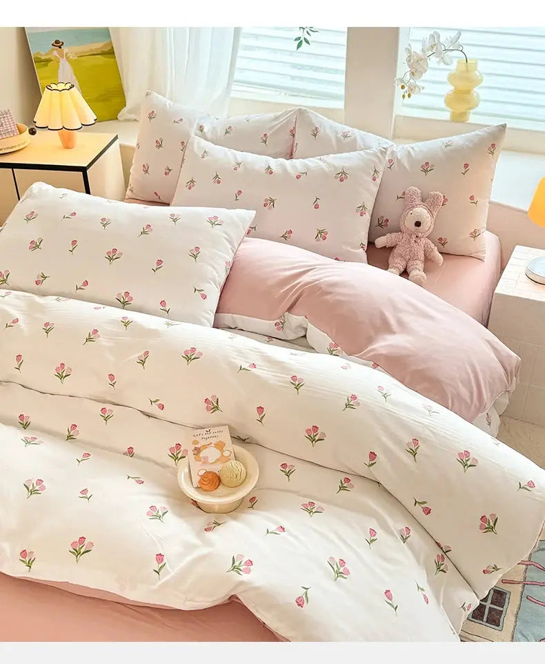 Tulip three-piece student bedding set by Simples Market with pink tulip print quilt cover and matching pillowcases