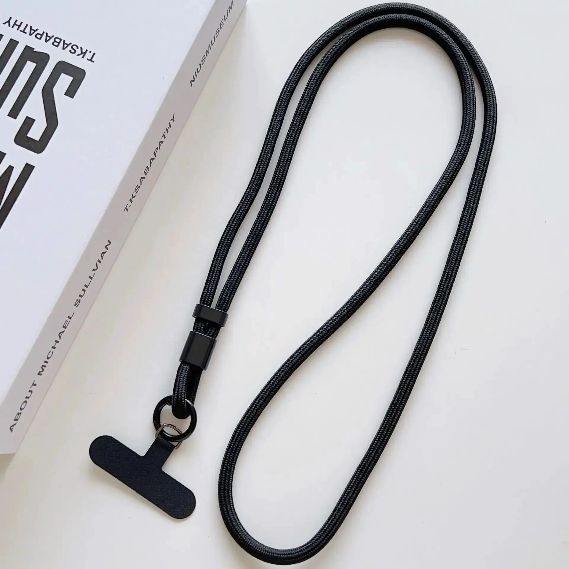 Simples Market black braided mobile phone lanyard with adjustable slider and metal ring