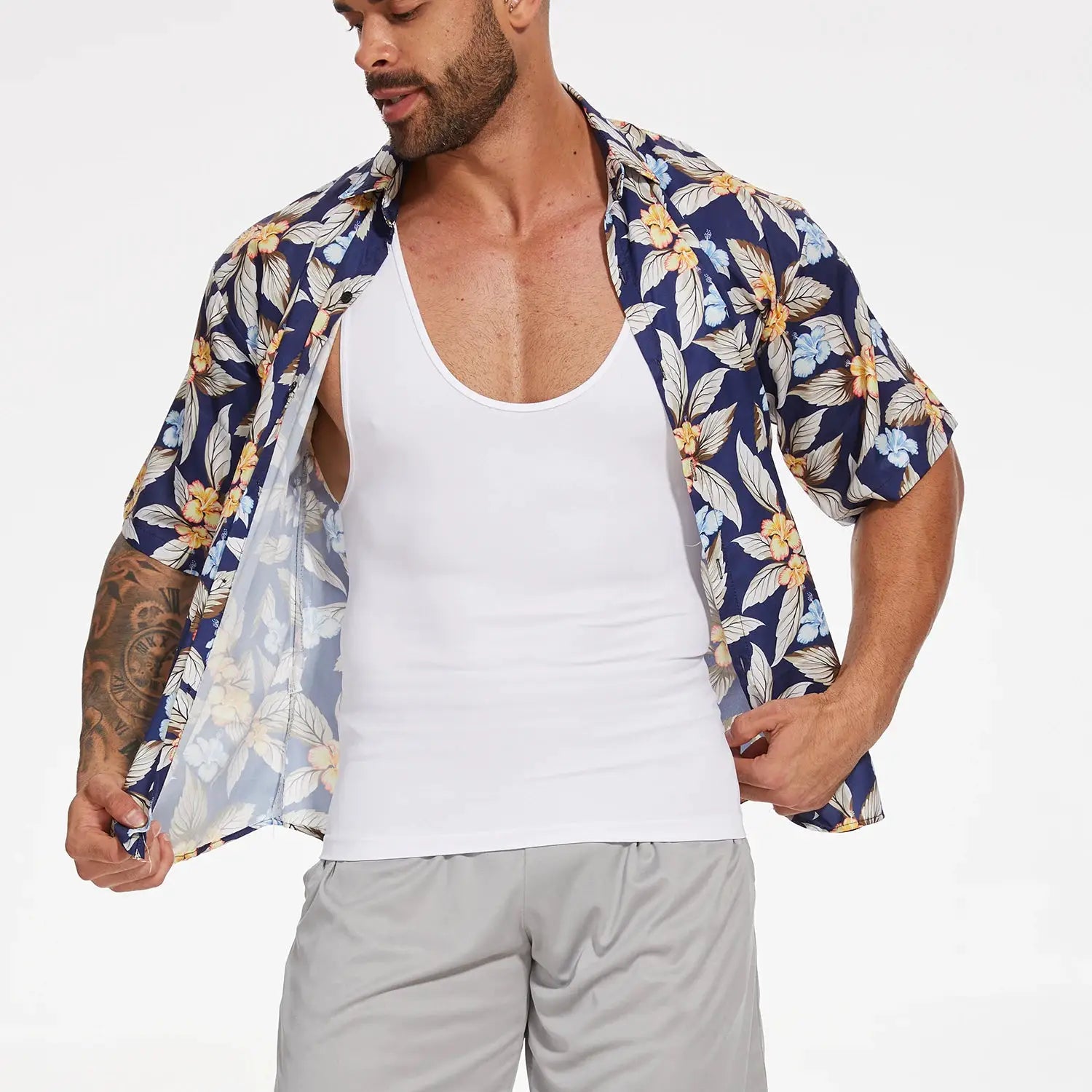 Men's white compression tank top paired with blue floral shirt (two tops shown)