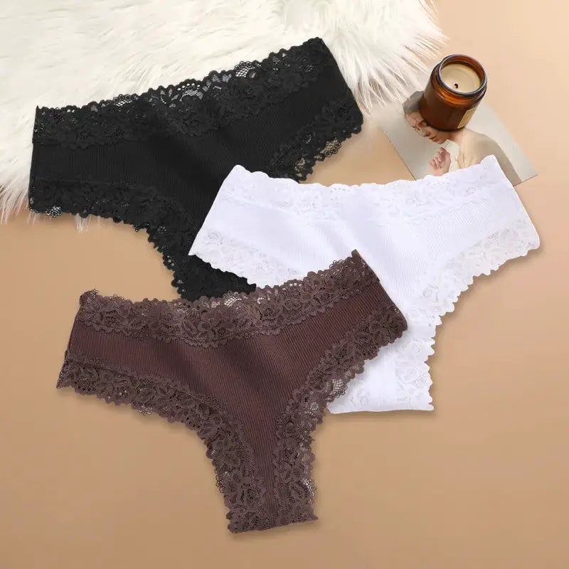 Three-piece set of women's cotton panties with floral lace trim in black, white, and brown