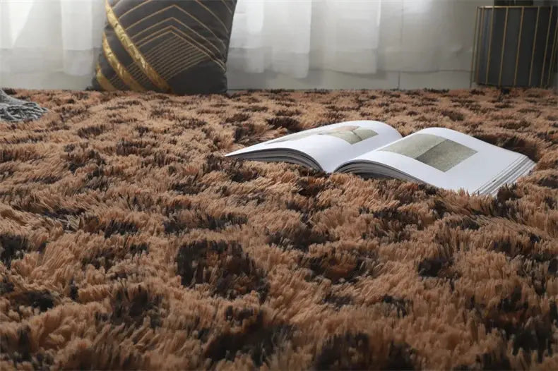 Simples Market fluffy brown shag area rug with darker spots; open magazine resting on plush carpet.