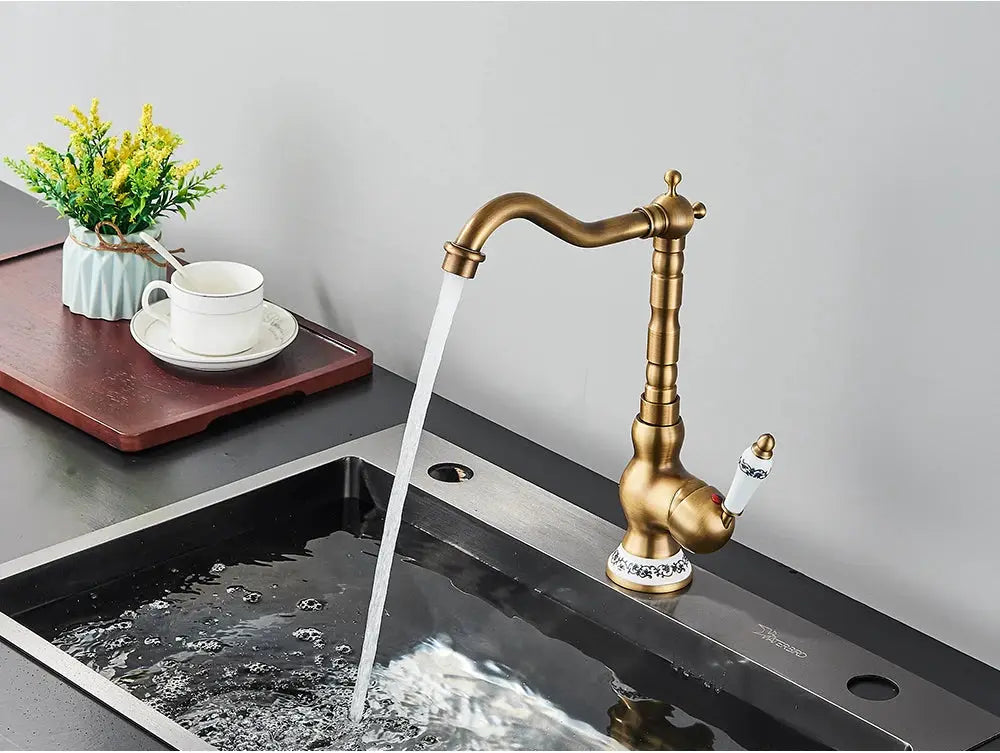 Antique brass basin sink mixer faucet by Simples Market with rotating spout