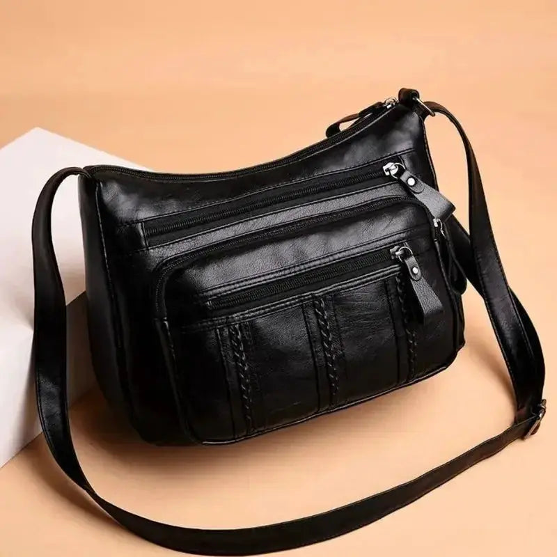 Simples Market black leather-look large-capacity multi-layer crossbody bag with zip pockets and adjustable strap