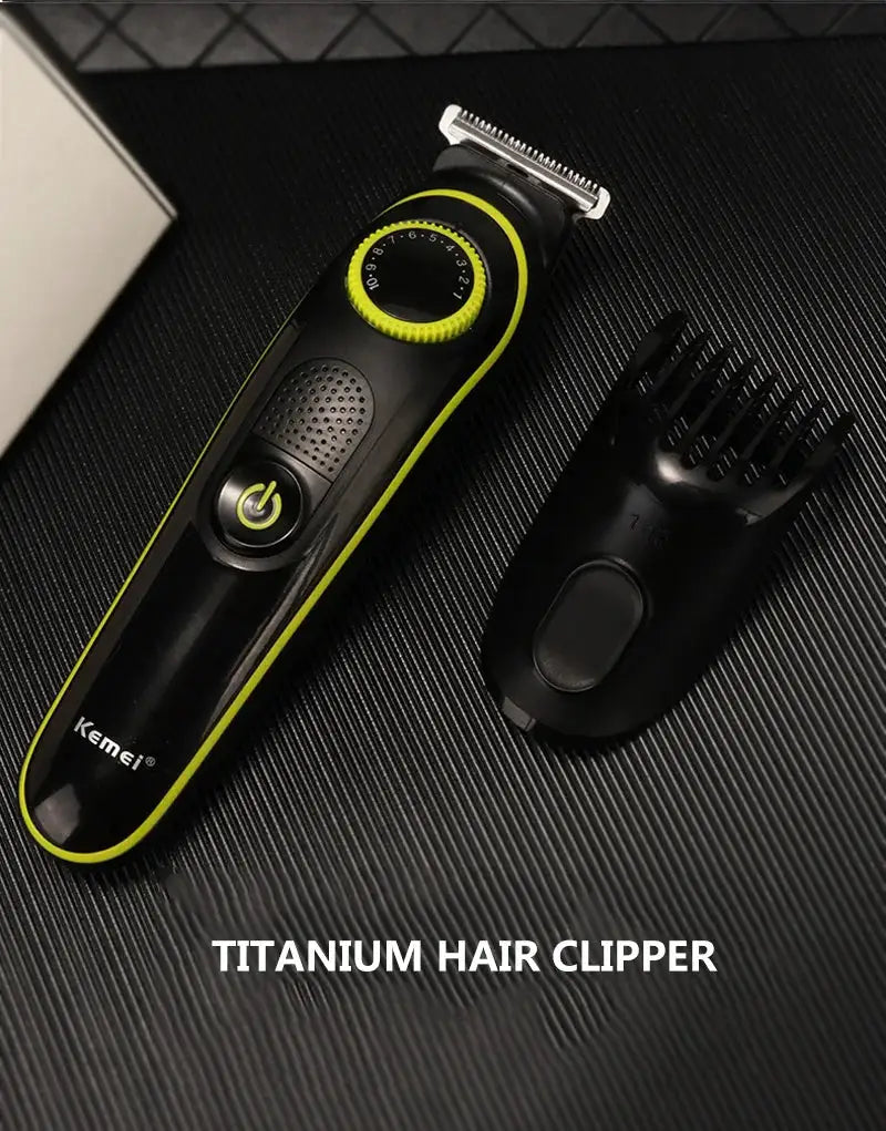 Kemei 696 electric hair clipper with neon green accents and detachable comb attachment.