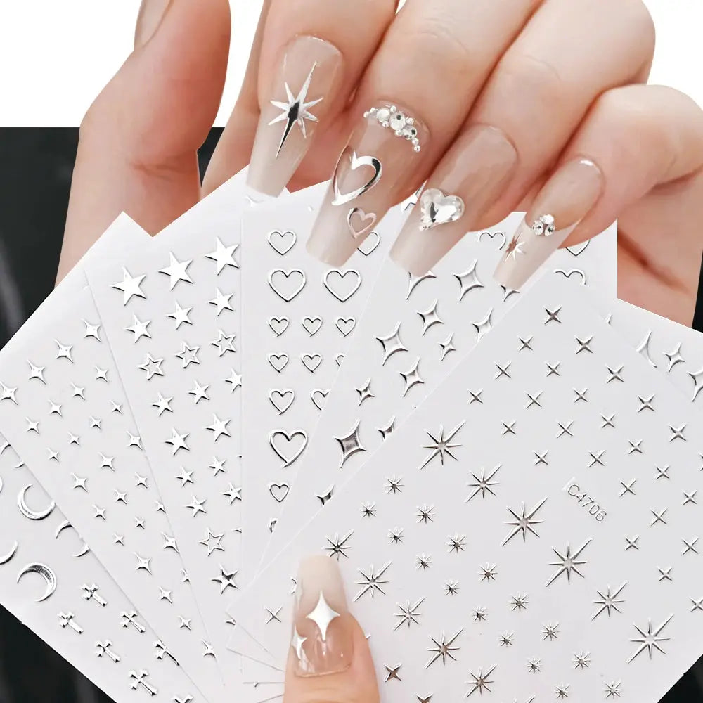 6 sheets of metal silver nail stickers with 3D star, heart and moon decals.
