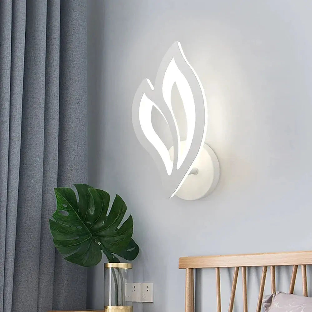 Leaf-shaped LED wall lamp by Simples Market; white modern wall light for living room decor