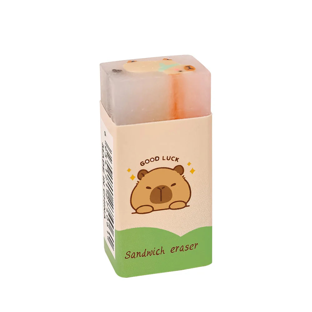 Capybara sandwich eraser by Simples Market; beige and green packaging with a cute cartoon capybara graphic.