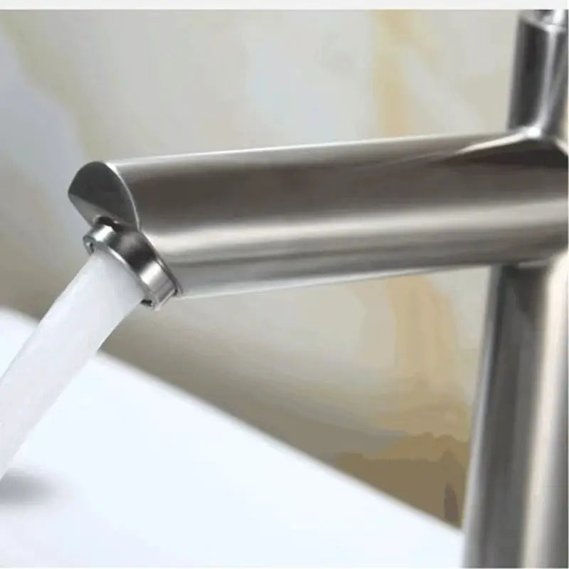 Stainless steel single cold water tap by Simples Market, deck-mounted lengthening basin faucet.
