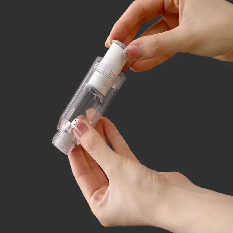 Travel portable pressurized shower head water filter, clear plastic body with white cartridge