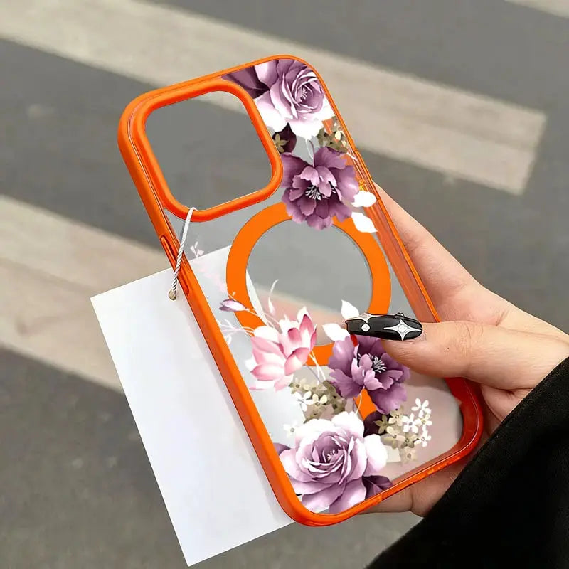 Phone case by Simples Market with lavender pink floral print and orange frame; wireless charging magnetic cover.