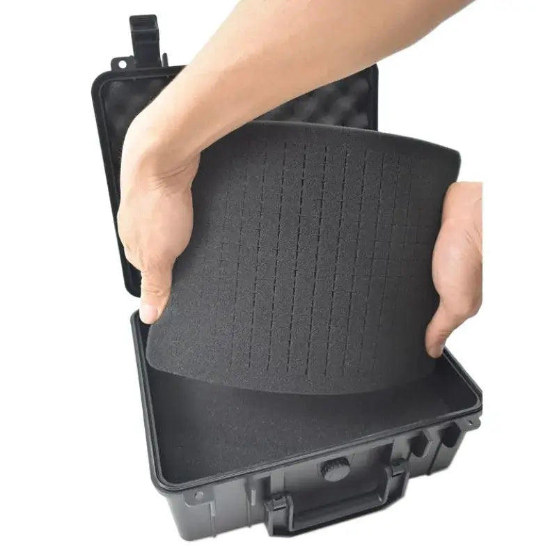 Hard-shell waterproof organizer box in black with foam insert; portable impact-resistant toolbox