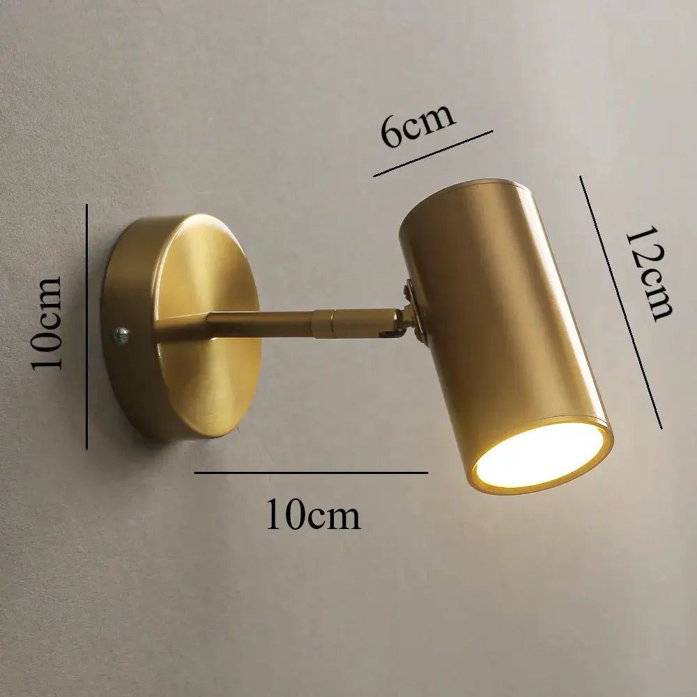 Nordic modern brass wall lamp by Simples Market with adjustable head and LED lighting