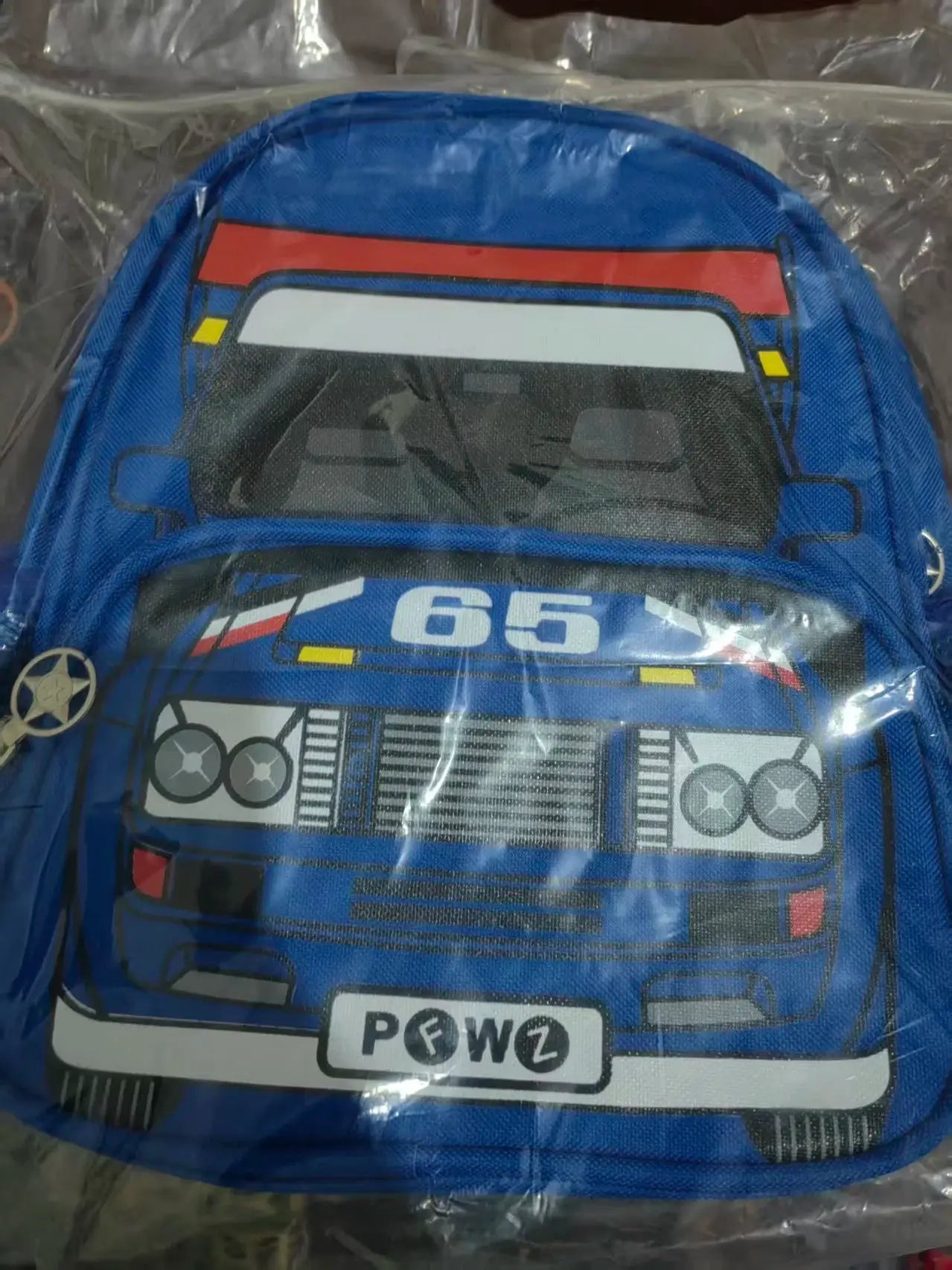 Blue police car backpack for kids with front car print, ideal for kindergarten.