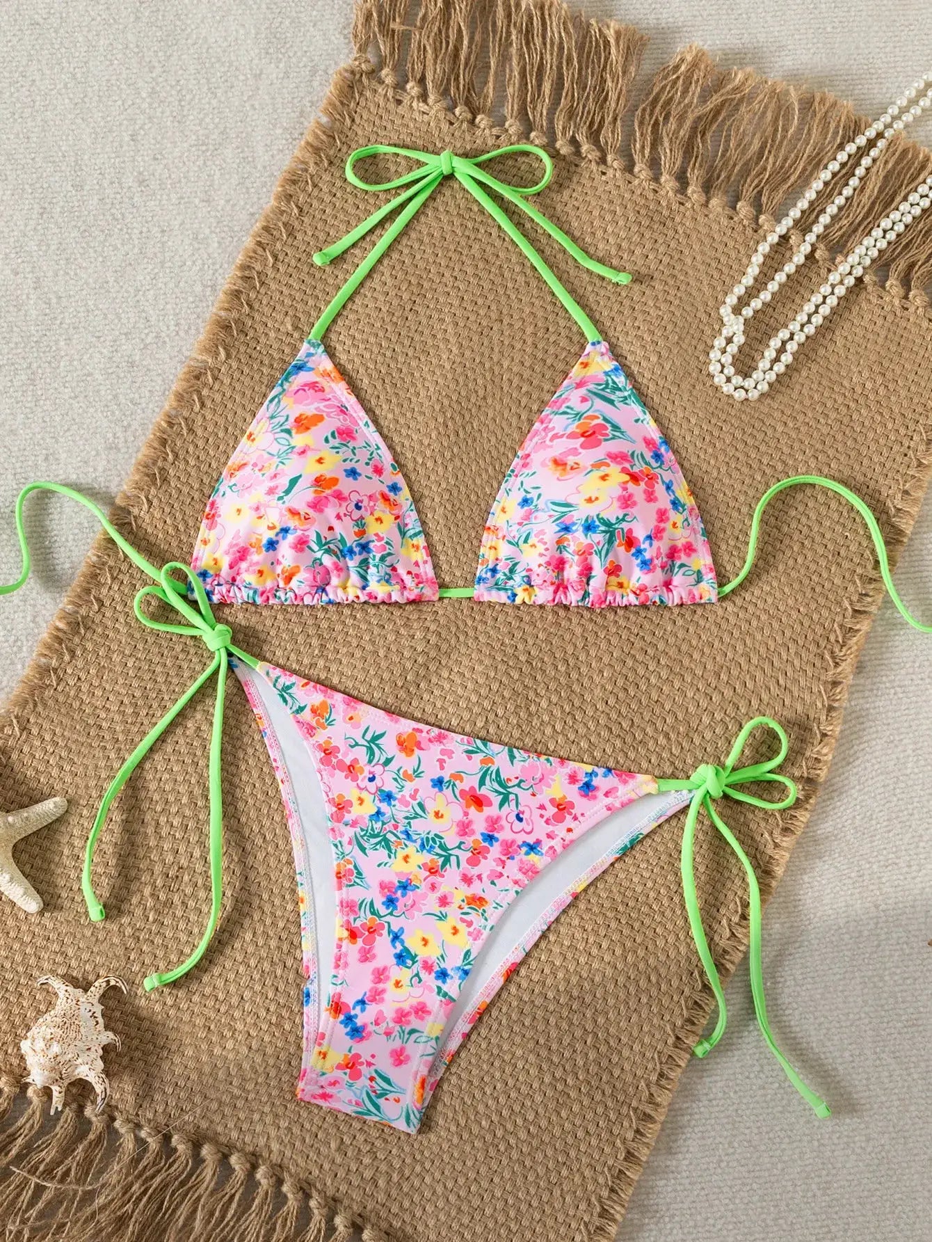 Triangle bikini set by Simples Market with floral print and neon-green straps, push-up top and Brazilian bottoms