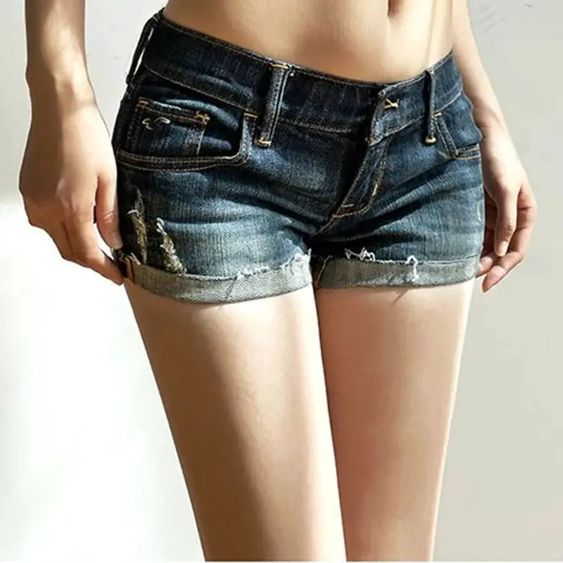Women's denim shorts by Simples Market, deep blue distressed low-waist with rolled cuffs