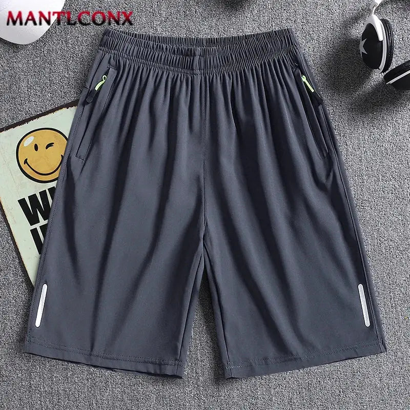 3XL quick-dry men's jogging shorts, dark gray with elastic waist and green zip pockets, Simples Market.