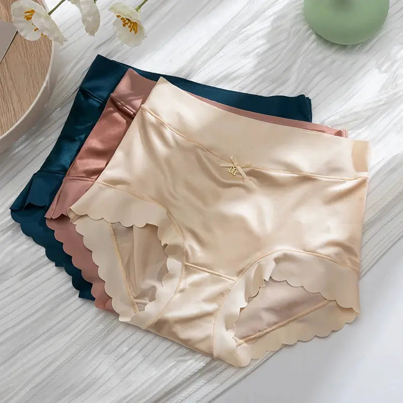 Silk panties set of 4 mid-rise briefs in beige, peach, pink, teal with scalloped edges and small bows by Simples Market