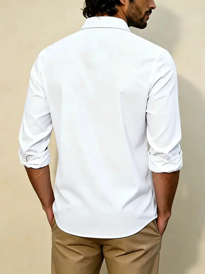 Men's white long-sleeve casual shirt with rolled sleeves and curved hem.
