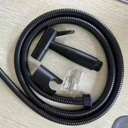 Black handheld bidet sprayer set with coiled hose and wall-mount bracket for toilet.