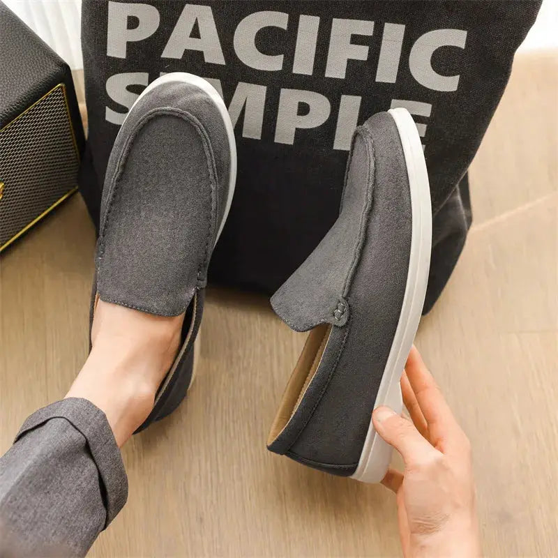 Men's suede loafers by Simples Market; grey slip-on driving moccasins with white sole