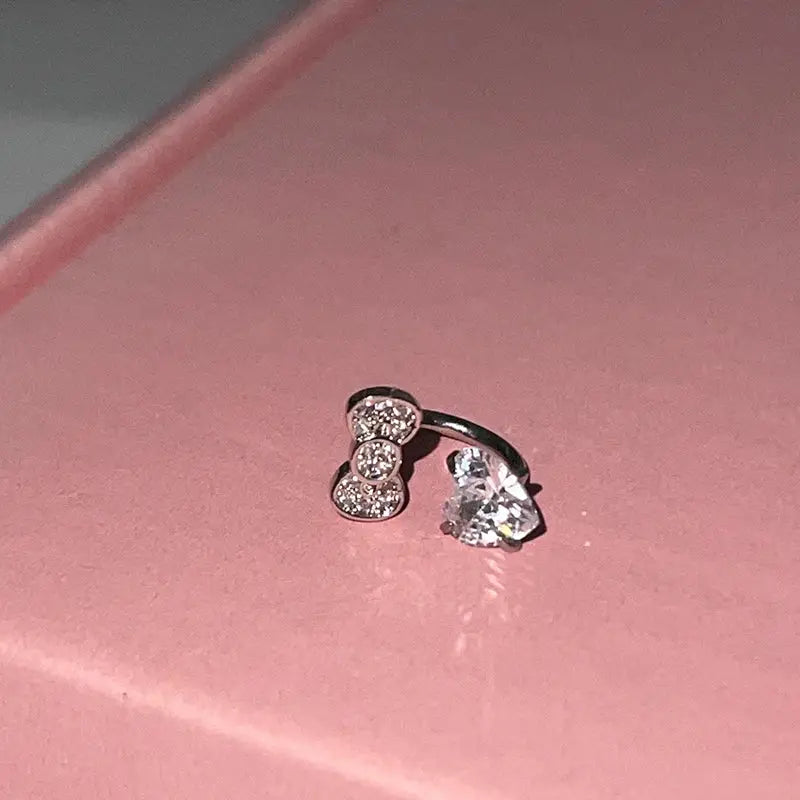Bowknot love heart ear bone nail ring in 316L stainless steel with zircon crystals from Simples Market