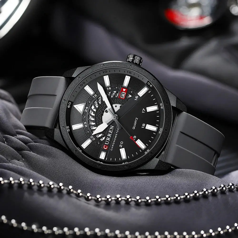 CURREN men's black sport watch with gray silicone strap, bold white indices, date window.