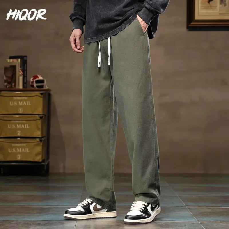 HIQOR men's casual cargo pants, olive green cotton wide-leg jogger style.