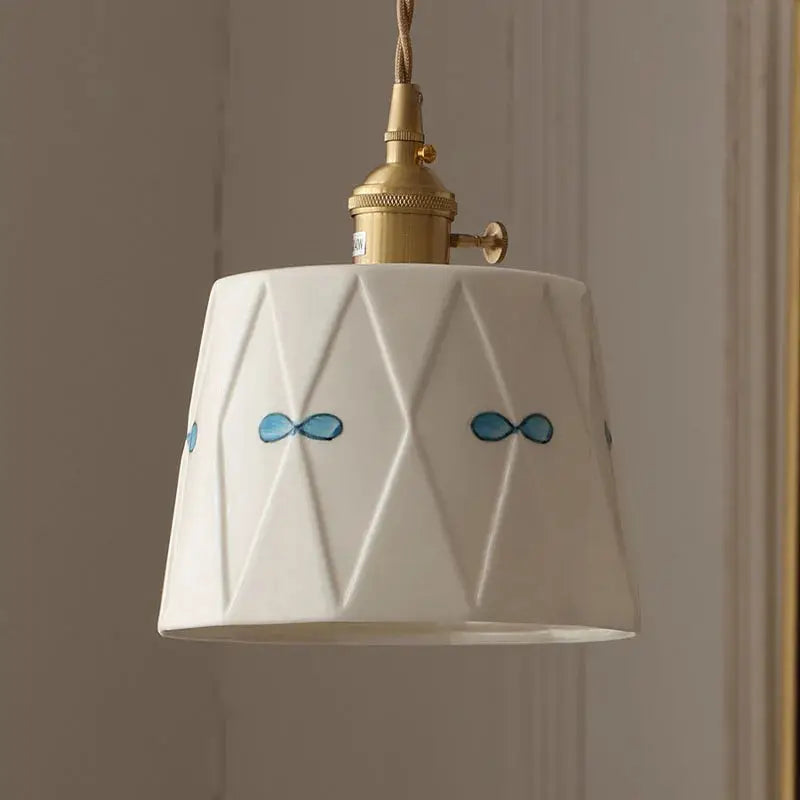 Japanese retro brass-glazed ceramic chandelier with a white drum shade featuring blue bow motifs