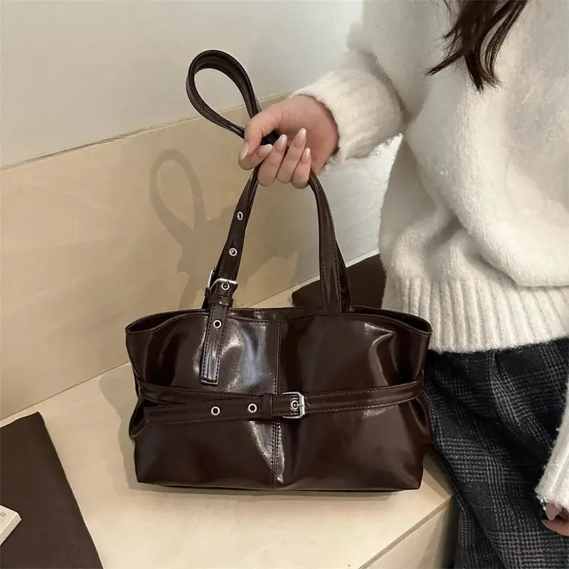 Leather handbag in dark brown with belt-buckle strap, shoulder bag
