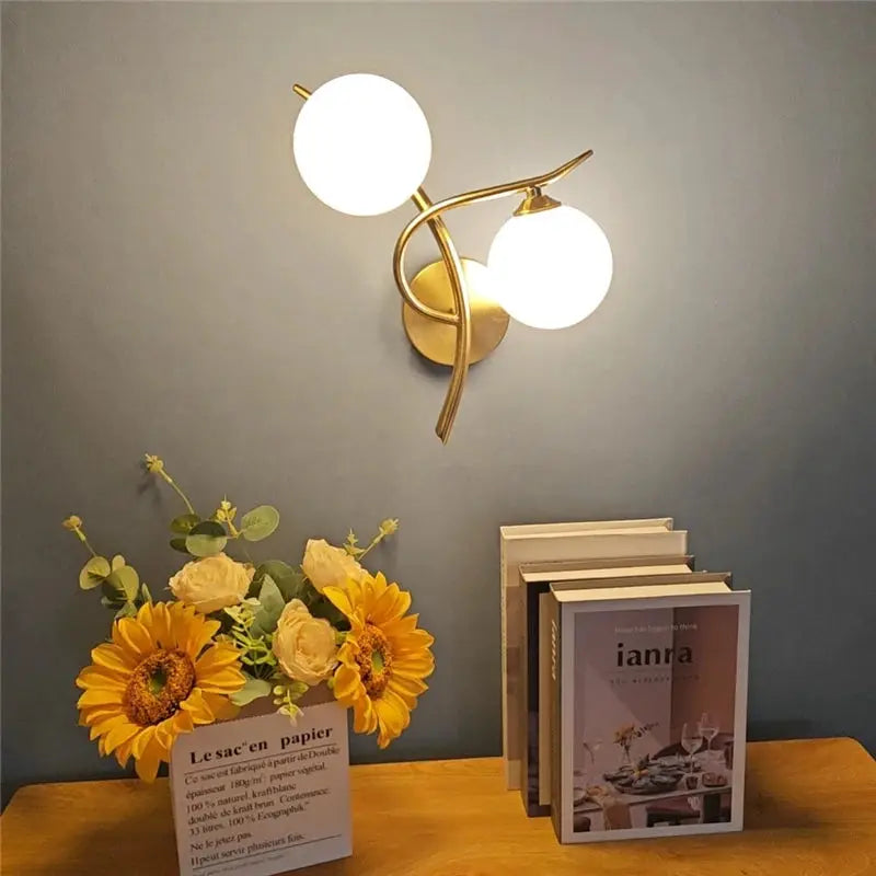 Nordic modern iron wall lamp with two glass globes, brass finish, LED G9 bulbs, Simples Market