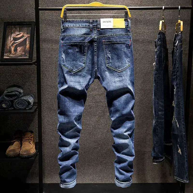 American elastic straight jeans for men, blue denim with distressed patches and back pockets