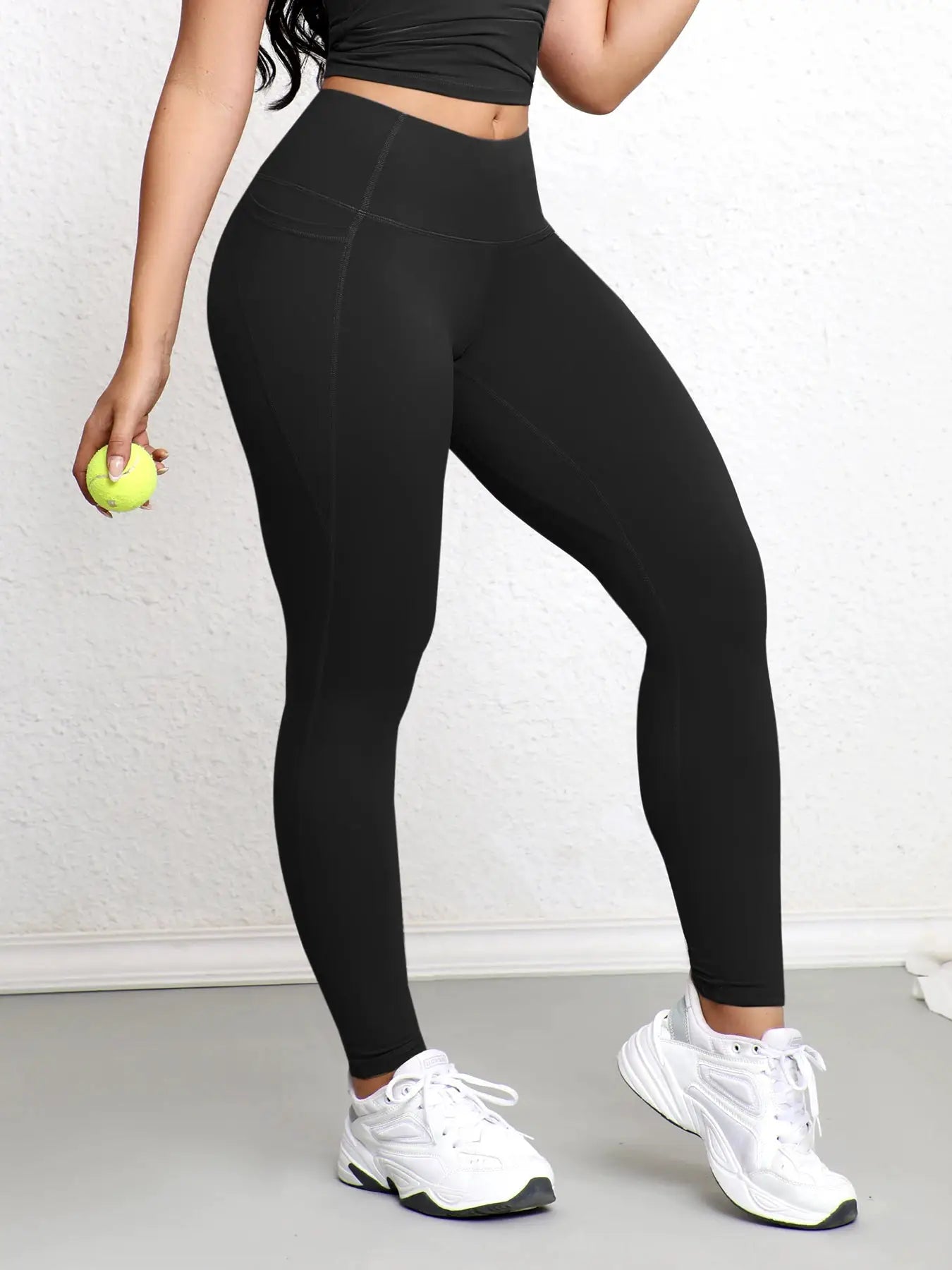 Women's black leggings with pockets, high-waist butt-lifting workout tights for activewear