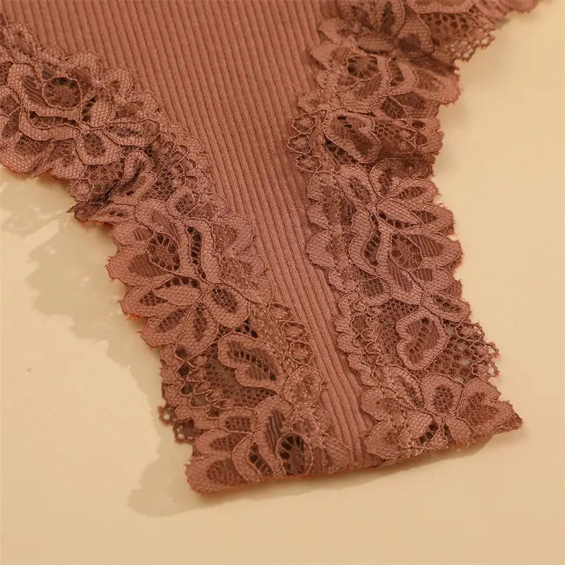 Simples Market 5-piece pink cotton panties set with floral lace trim.