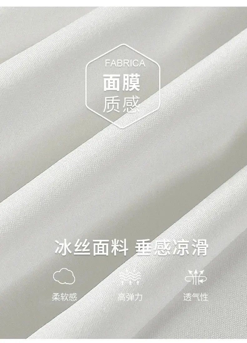 White silk-like fabric close-up with FABRICA logo, soft drape and breathable texture.