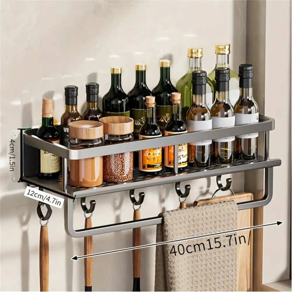 Multi-functional wall-mounted storage rack in gray metal with two tiers, utensil hooks, and towel bar