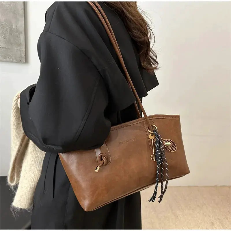 European American retro tote bag by Simples Market in brown leather with shoulder strap and pendant scarf