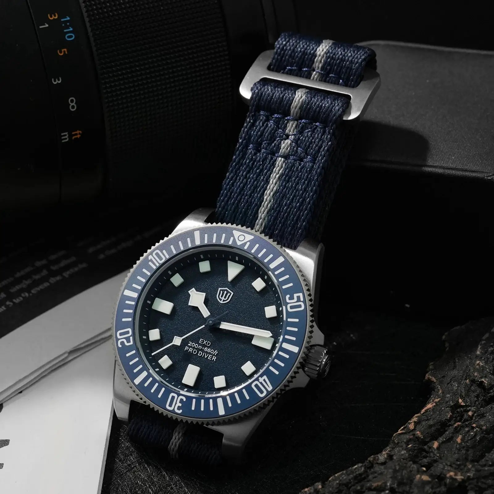 Watchdives EXD 40mm titanium dive watch with blue dial, luminous markers, blue NATO strap, 200m water resistance