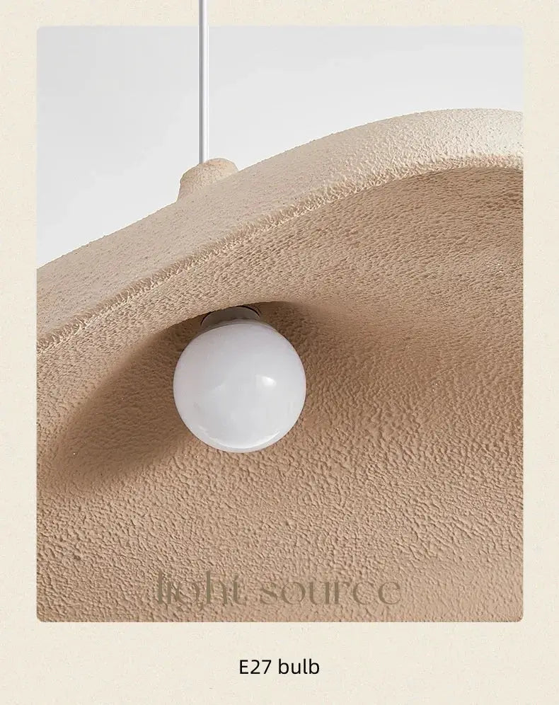 Pendant light in Japanese Wabi Sabi style with beige textured shade and white E27 bulb by Simples Market