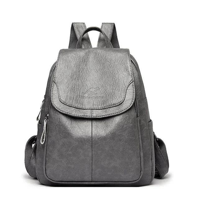 Soft leather backpack for women in gray by Simples Market with front flap and top handle